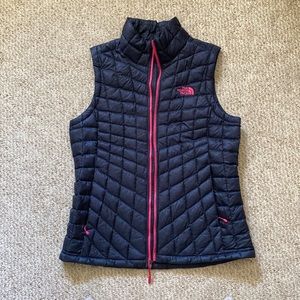 navy/pink north face vest
